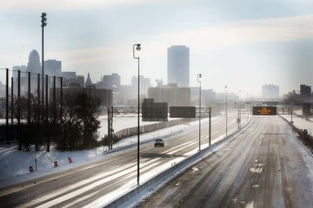 A single car drives along Route 190 in Buffalo, New York, November 19, 2014. REUTERS/Lindsay DeDario