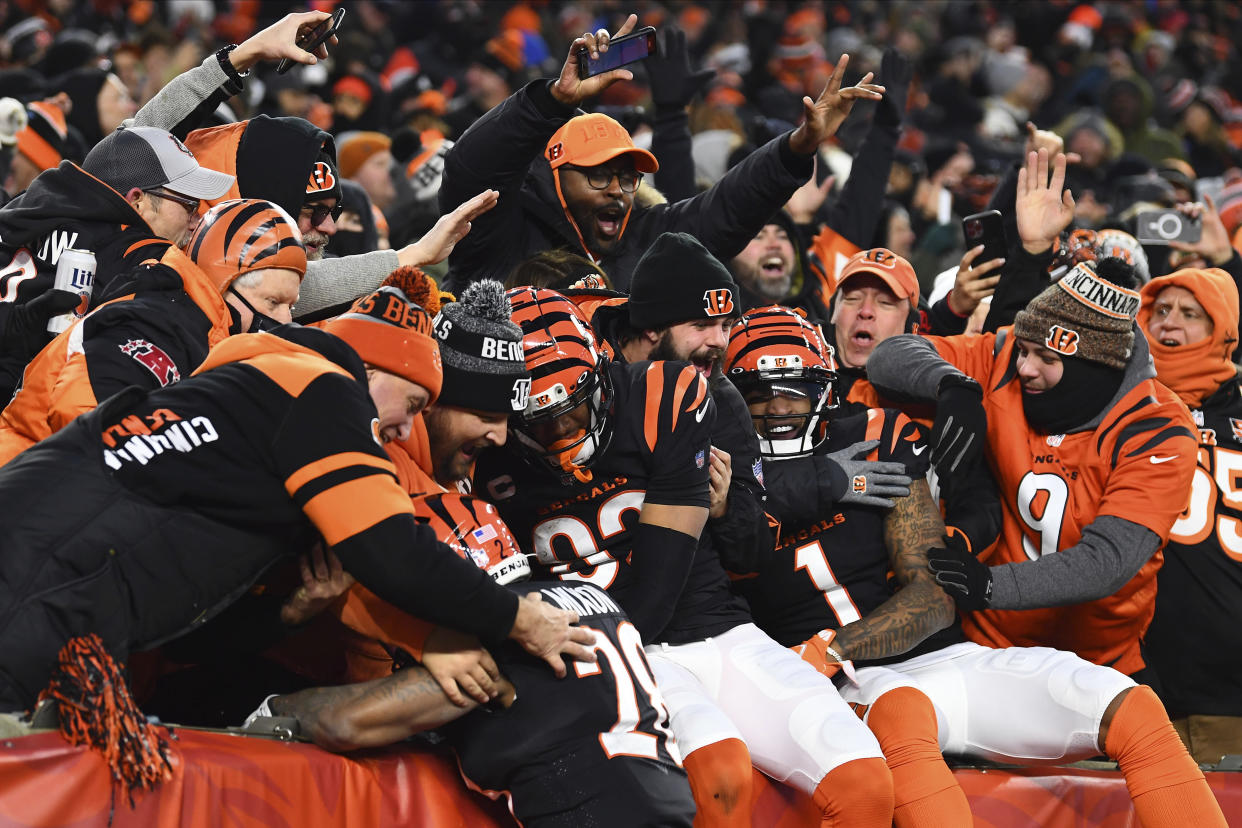 The Bengals and their fans waited a long time to celebrate a night like Saturday. (AP Photo/Emilee Chinn)