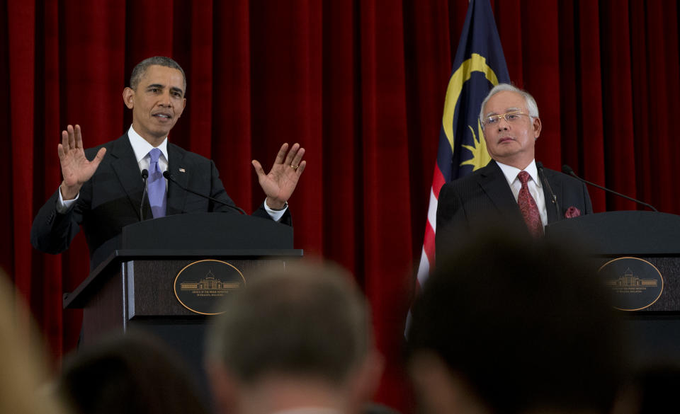 U.S. President Barack Obama and Malaysian Prime Minister Najib Razak participate in a joint news conference at the Prime Minister's Office, in Putrajaya, Malaysia, Sunday, April 27, 2014. (AP Photo/Carolyn Kaster)