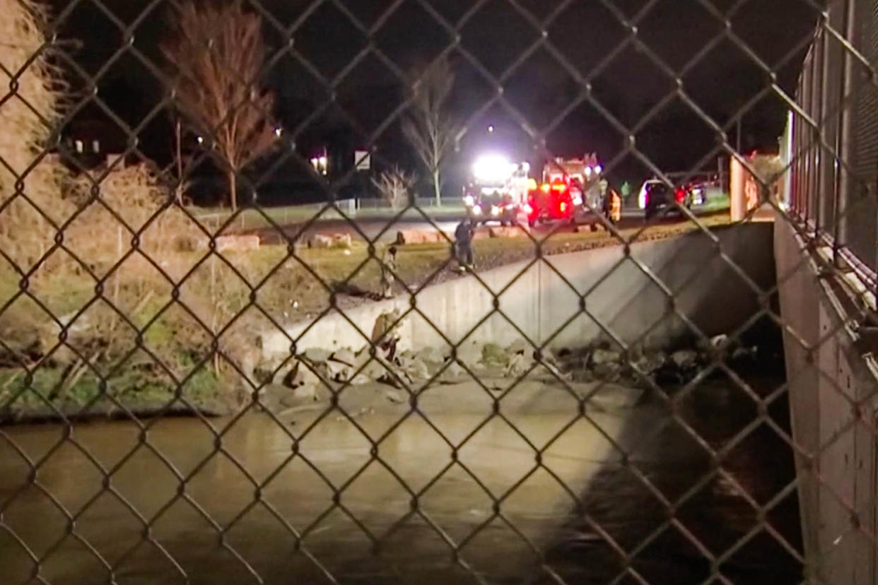 Rescue crews at Chester Creek (WCAU)