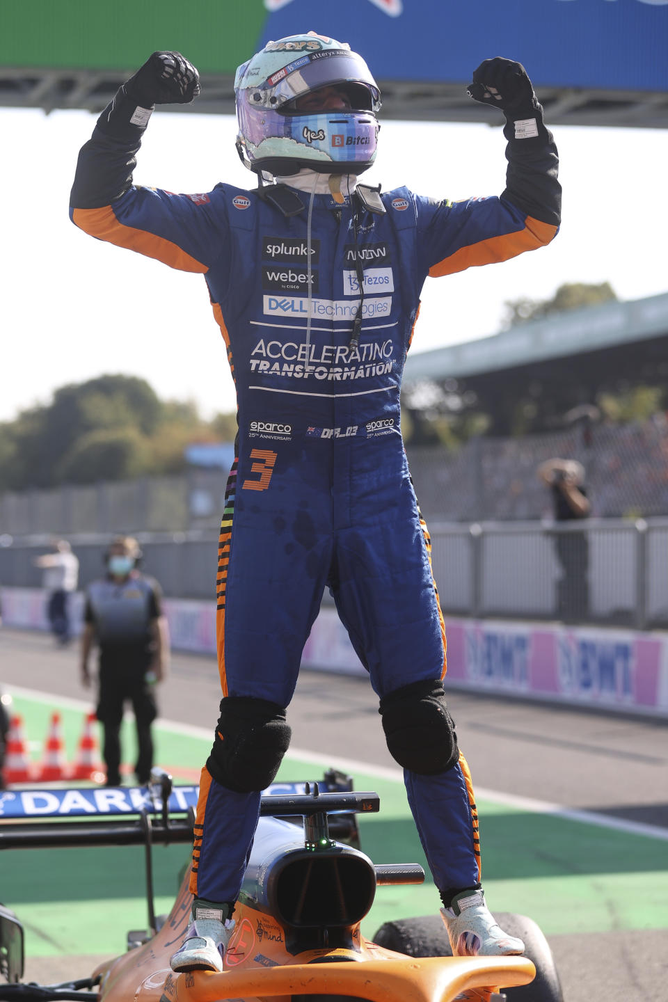 Mclaren driver Daniel Ricciardo of Australia celebrates after winning the Italian Formula One Grand Prix, at Monza racetrack, in Monza, Italy, Sunday, Sept.12, 2021. (Lars Baron/Pool via AP)