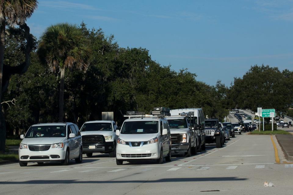 Barrier island commuters pass through Beachland Elementary's school zone, Wednesday, Sept. 6, 2023, in Vero Beach. Traffic is being detoured over the Merrill P. Barber Bridge, while the Alma Lee Loy Bridge to 17th Street is closed for the next few days as Florida Department of Transportation workers restripe the south side of the bridge to allow for use during future construction on the bridge. FDOT said the bridge is "structurally deficient" because of crumbling concrete and exposed cables. Temporary fixes have been ongoing since 2020.