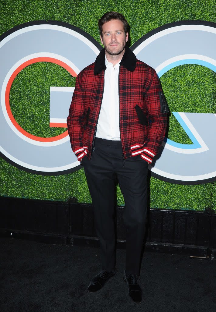 <p>Hammer wore a red plaid bomber jacket by Tommy Hilfiger to keep warm during the GQ Men of the Year party. (Photo: Getty Images) </p>