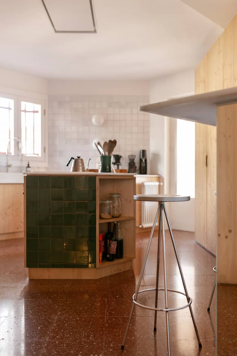 Bar stool in light airy kitchen.