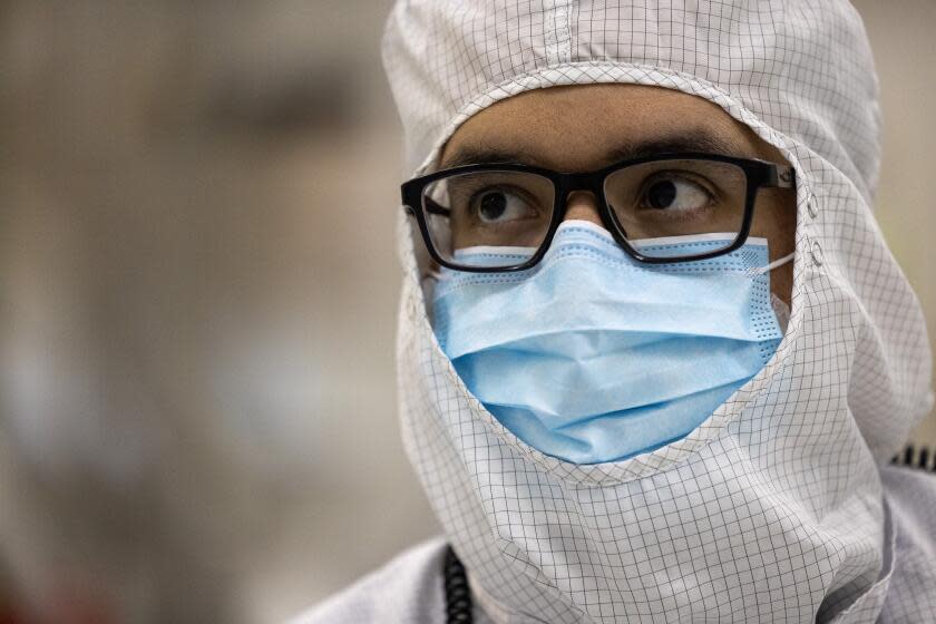 Pasadena, CA - October 03: Mechanical engineer Steve Barajas in the High Bay Clean Room harboring NASA's Europa Clipper space probe at the Jet Propulsion Laboratory on Tuesday, Oct. 3, 2023 in Pasadena, CA. (Brian van der Brug / Los Angeles Times)