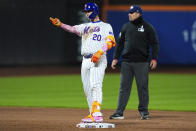 New York Mets' Pete Alonso (20) reacts after doubling on a sharp fly ball during the sixth inning of a baseball game against the Atlanta Braves, Sunday, May 12, 2024, in New York. (AP Photo/Julia Nikhinson)