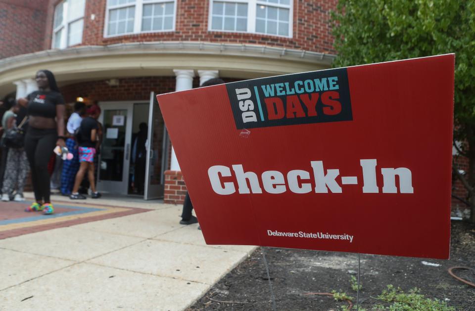 Students line up for move-in as upperclassmen return to campus and University Village housing at Delaware State University in Dover, Saturday, August 26, 2023.