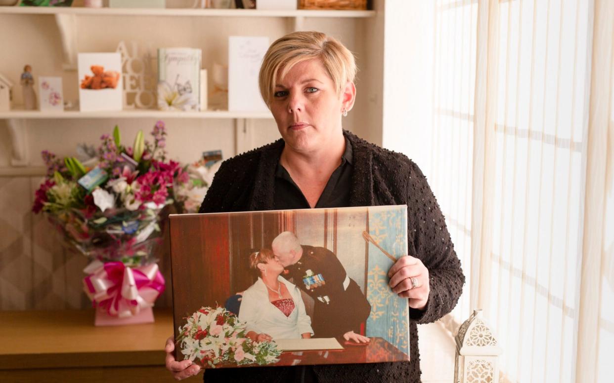 Jo Jukes at her home in Birmingham. Her husband, Dave, killed himself in their garden after repeated pleas for help with his mental health were ignored - Andrew Fox