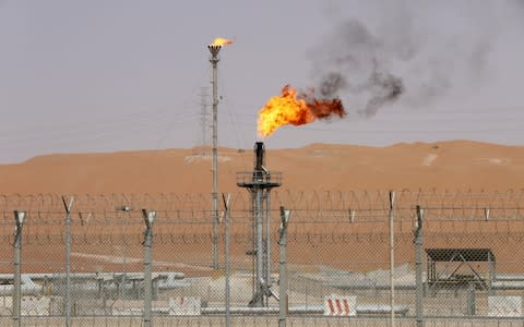 Flames are seen at the production facility of Saudi Aramco's Shaybah oilfield in the Empty Quarter, Saudi Arabia  - Credit: Ahmed Jadallah/&nbsp;REUTERS