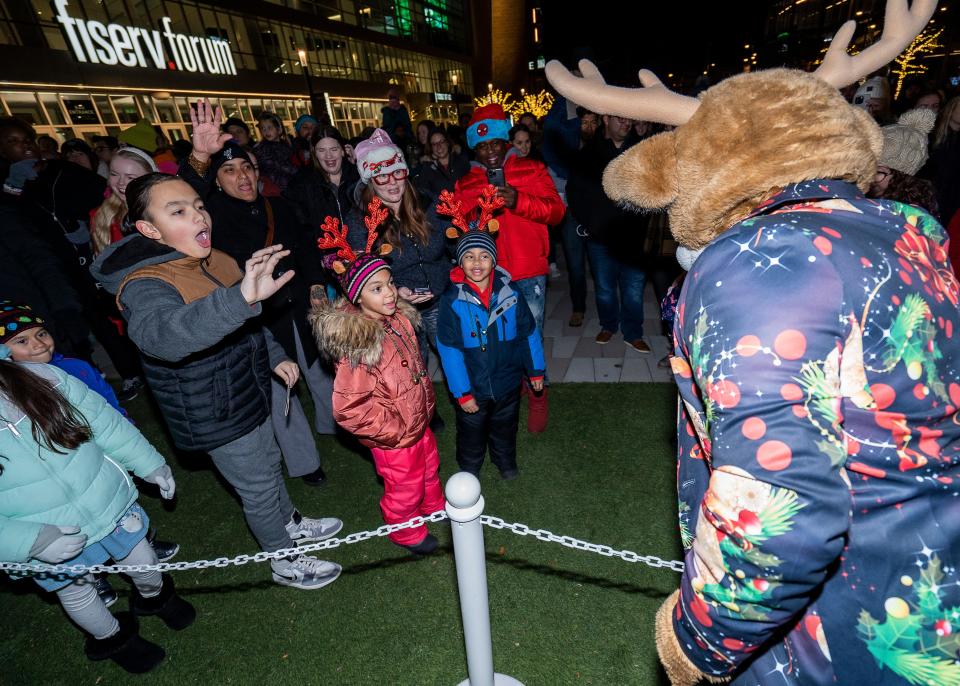 Milwaukee Bucks mascot Bango greets kids during the 2023 City of Milwaukee Christmas Tree Lighting Ceremony at Deer District on Friday November 17, 2023 at the Fiserv Forum in Milwaukee, Wis. 

Jovanny Hernandez / Milwaukee Journal Sentinel