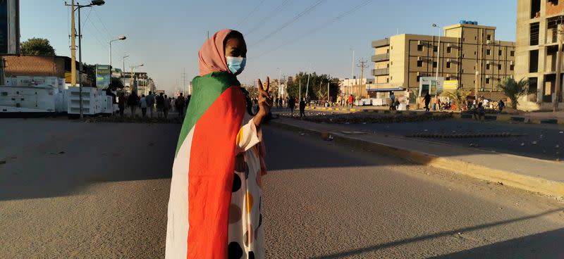 People attends a protest in Khartoum