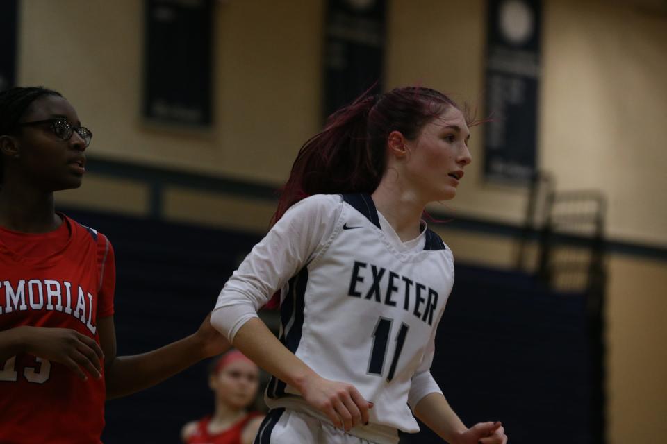 Exeter High School's Emma Smith scored 23 points, including a game-tying 3-pointer in the final seconds of regulation of Tuesday's Division I first round game against Manchester Memorial.. The Blue Hawks saw their season come to an end with a 46-55 overtime loss.