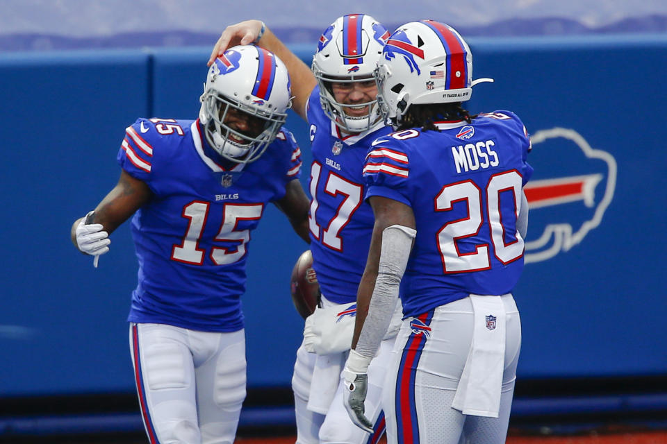 Buffalo Bills wide receiver John Brown (15) celebrates after catching a touchdown pass thrown by quarterback Josh Allen (17) in the first half of an NFL football game against the Miami Dolphins, Sunday, Jan. 3, 2021, in Orchard Park, N.Y. (AP Photo/John Munson)