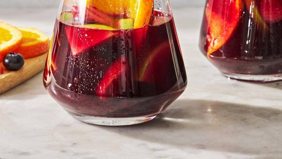 red sangria with fruit and cinnamon sticks