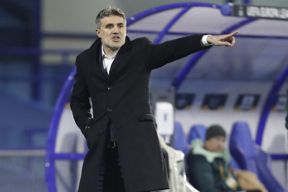 *FILE* In this Thursday, Feb. 25, 2021 file photo, Dinamo head coach Zoran Mamic gestures during the Europa League round of 32 second leg soccer match between Dinamo Zagreb and Krasnodar at the Maksimir stadium in Zagreb, Croatia. According to a statement late Monday March 15, 2021, Mamic has resigned after the Croatian supreme court confirmed his nearly five-year prison sentence for tax evasion and fraud, just days before a Europa League match against Tottenham.(AP Photo/Darko Bandic, File)