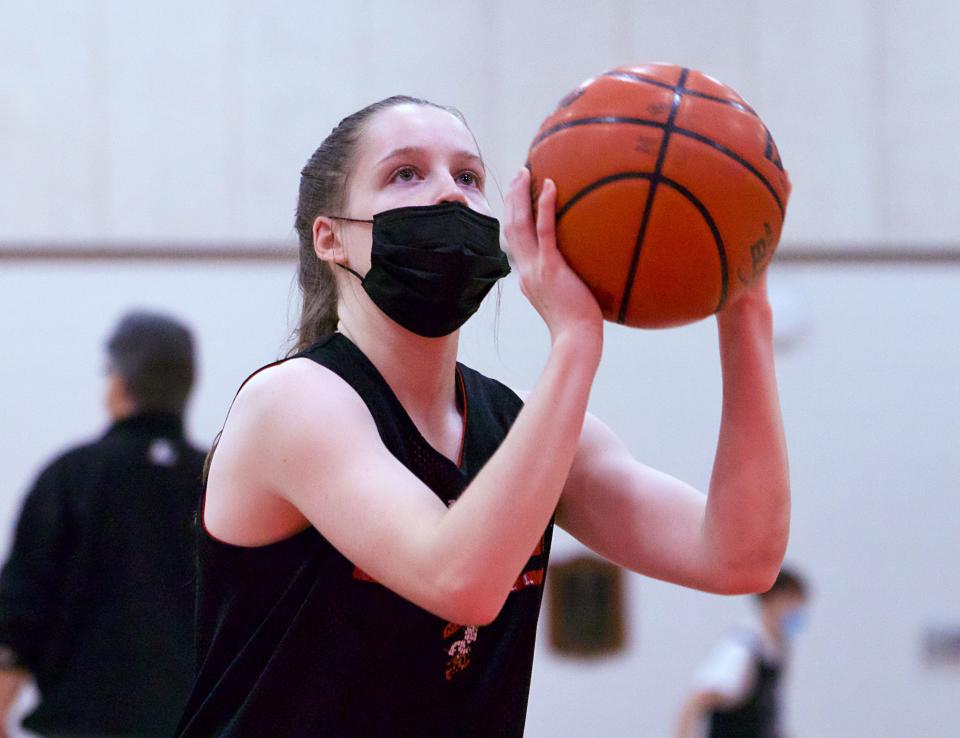 North Quincy's Orlagh Gormley shoots at practice on Thursday, January 13, 2022.