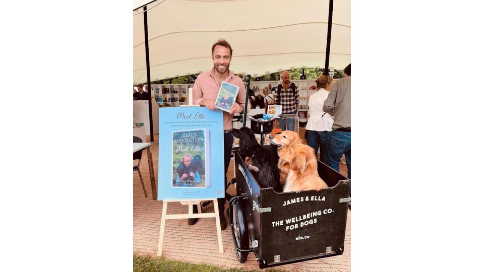 james middleton at book event with dogs 