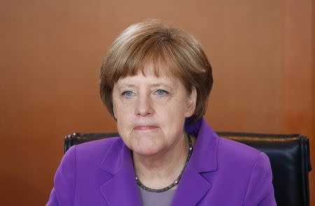 German Chancellor Angela Merkel reacts at the start of a cabinet meeting at the Chancellery in Berlin April 29, 2015. REUTERS/Hannibal Hanschke