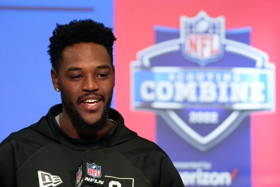 Purdue wide receiver David Bell speaks during a press conference at the NFL football scouting combine, Wednesday, March 2, 2022, in Indianapolis. (AP Photo/Darron Cummings)