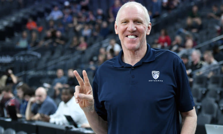 Bill Walton giving a peace sign.