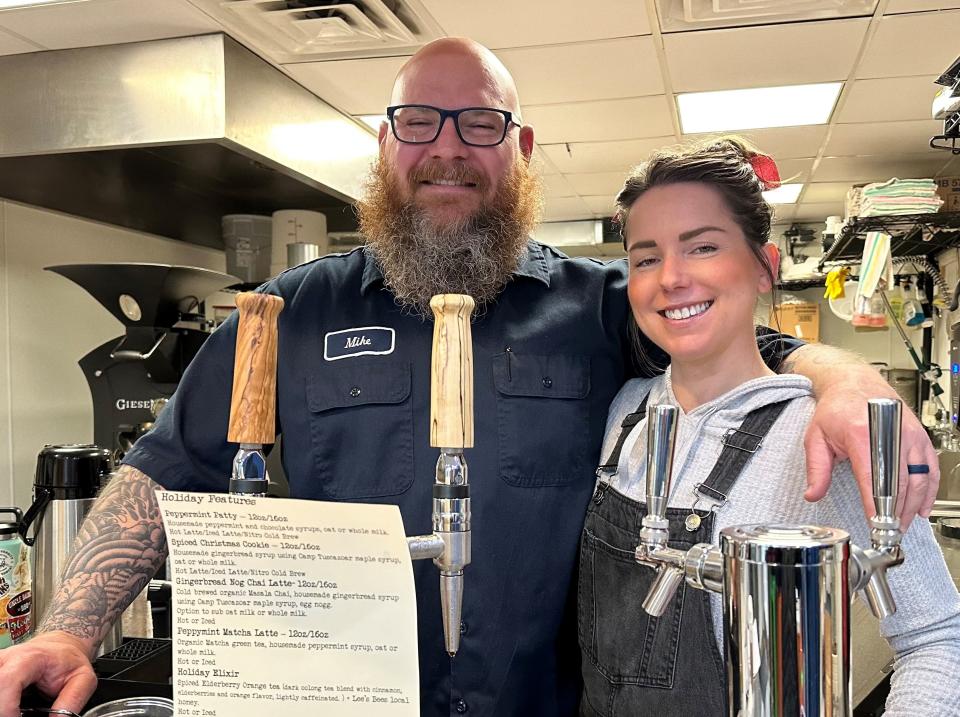 Mike and Hannah Moyer, owners of M&H Beans Coffee Roastery, sell coffee by the cup and bags of freshly roasted beans.