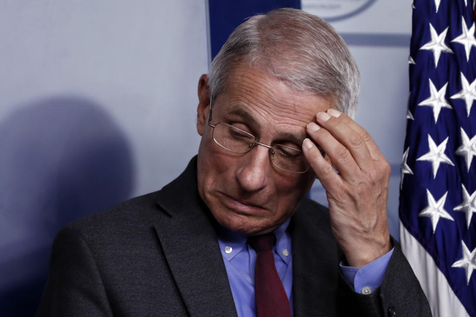 Dr. Anthony Fauci, director of the National Institute of Allergy and Infectious Diseases, listens during a briefing on coronavirus in the Brady press briefing room at the White House, Saturday, March 14, 2020, in Washington. (AP Photo/Alex Brandon)