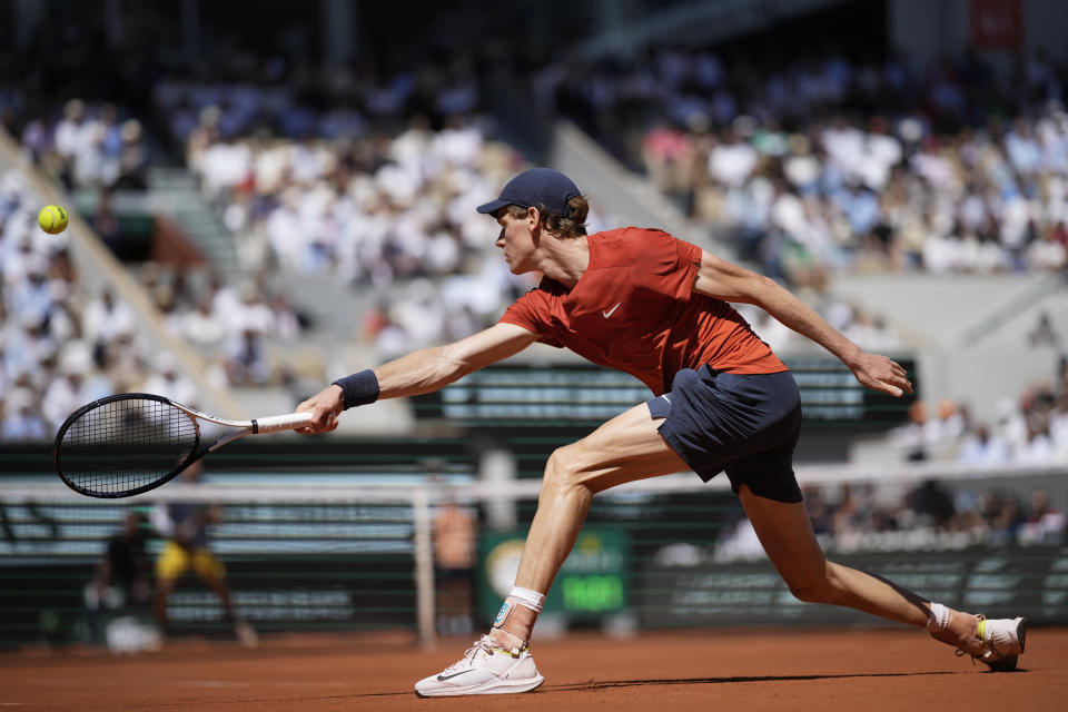 Italy's Jannik Sinner plays a shot against Spain's Carlos Alcaraz during their semifinal match of the French Open tennis tournament at the Roland Garros stadium in Paris, Friday, June 7, 2024. (AP Photo/Christophe Ena)