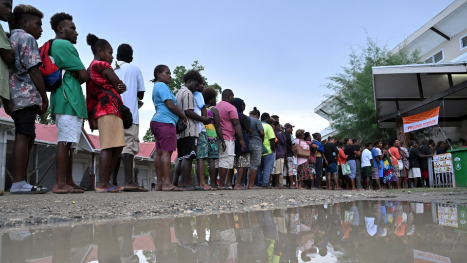 Voters queue at a polling station to vote during the national election in the Solomon Islands, in Honiara, Solomon Islands, April 17, 2024.