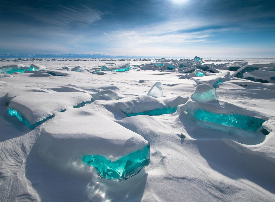 Lake Baikal in Siberia, frozen over for five months every year, is renowned for its many ice formations and their turquoise appearance.