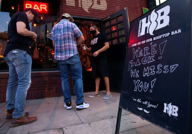 FILE PHOTO: Bars reopen in Austin after being shut down to stop the spread of the coronavirus disease (COVID-19)