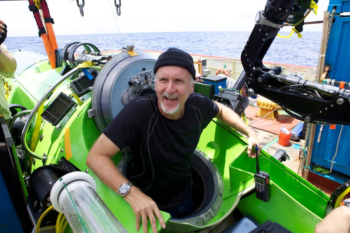 James Cameron emerges from the Deepsea Challenger in 2012 after making the first solo trip to the world’s deepest point  (AP)