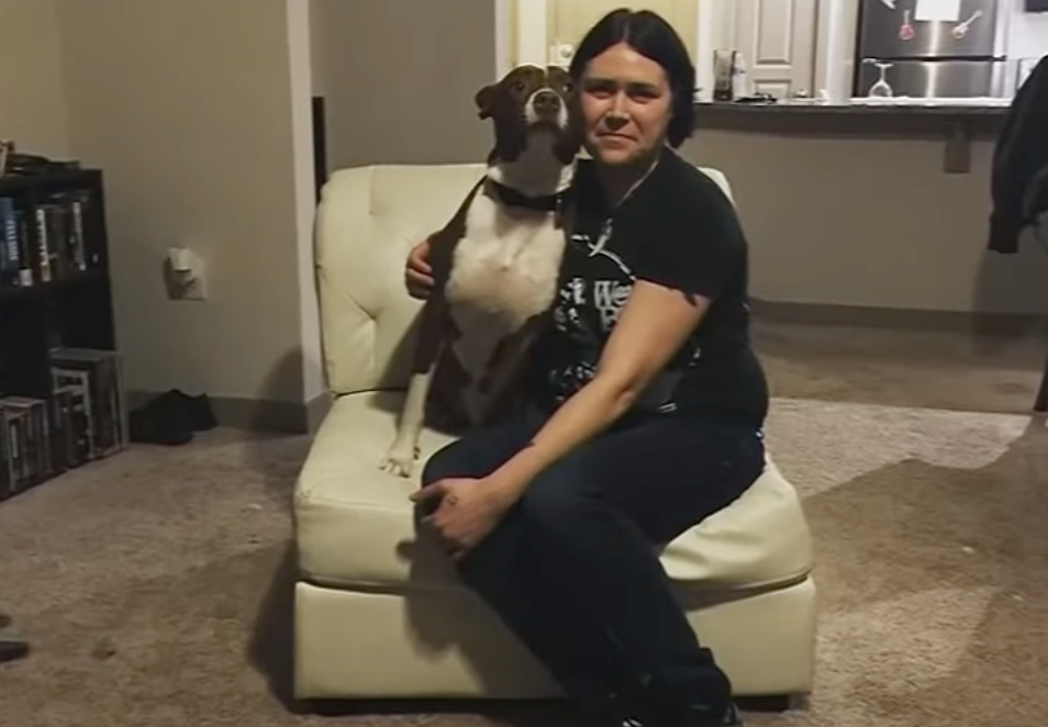 Katherine Janness, 40, pictured with a dog.