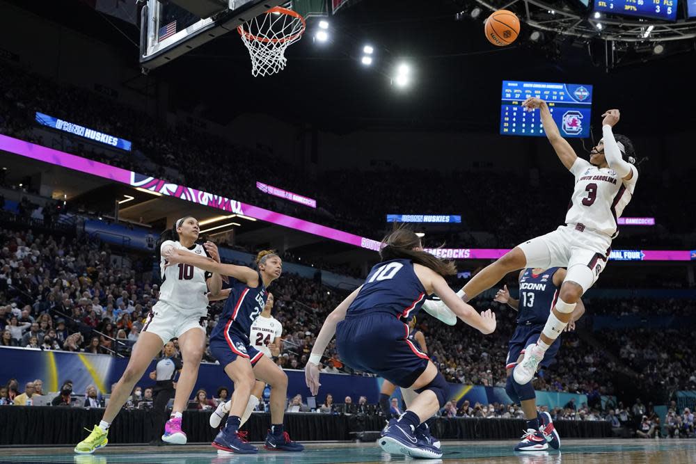 South Carolina’s Destanni Henderson shoots during the second half of a college basketball game in the final round of the Women’s Final Four NCAA tournament Sunday, April 3, 2022, in Minneapolis. (AP Photo/Eric Gay)