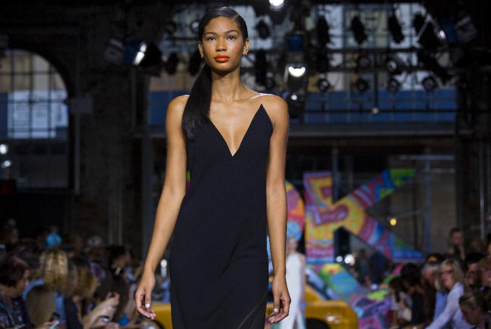 The DKNY Spring 2014 collection is modeled during Fashion Week in New York, Sunday, Sept. 8, 2013. (AP Photo/Craig Ruttle)