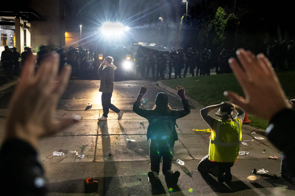 IMAGE: Protesters shout 