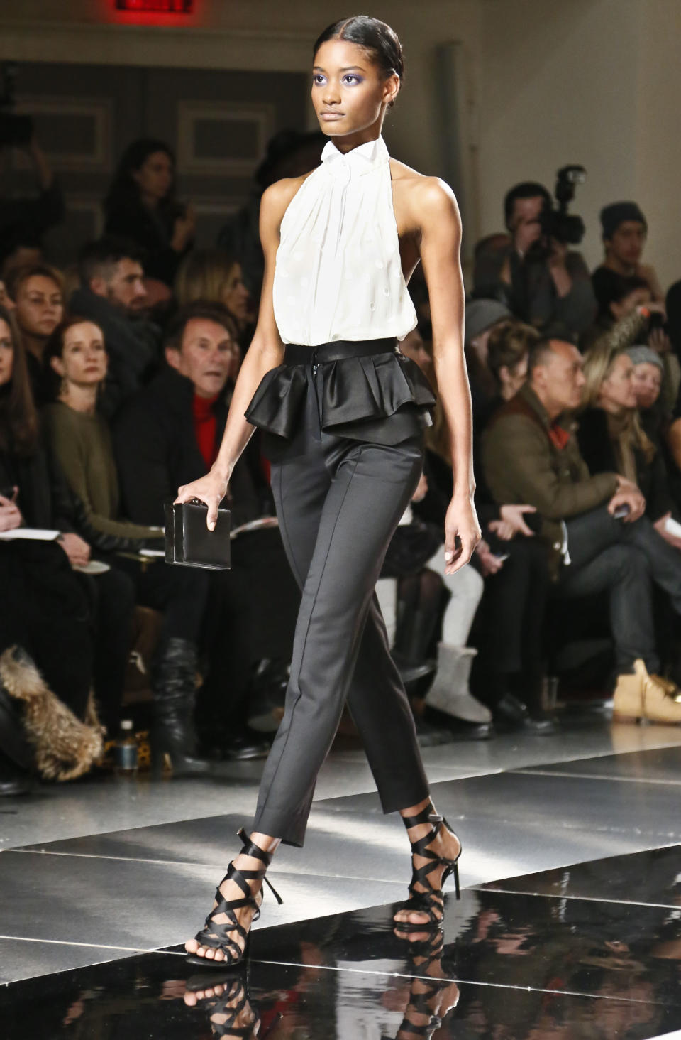 Fashion from the Fall 2013 collection of Jason Wu is modeled on Friday, Feb. 8, 2013 in New York. (AP Photo/Bebeto Matthews)