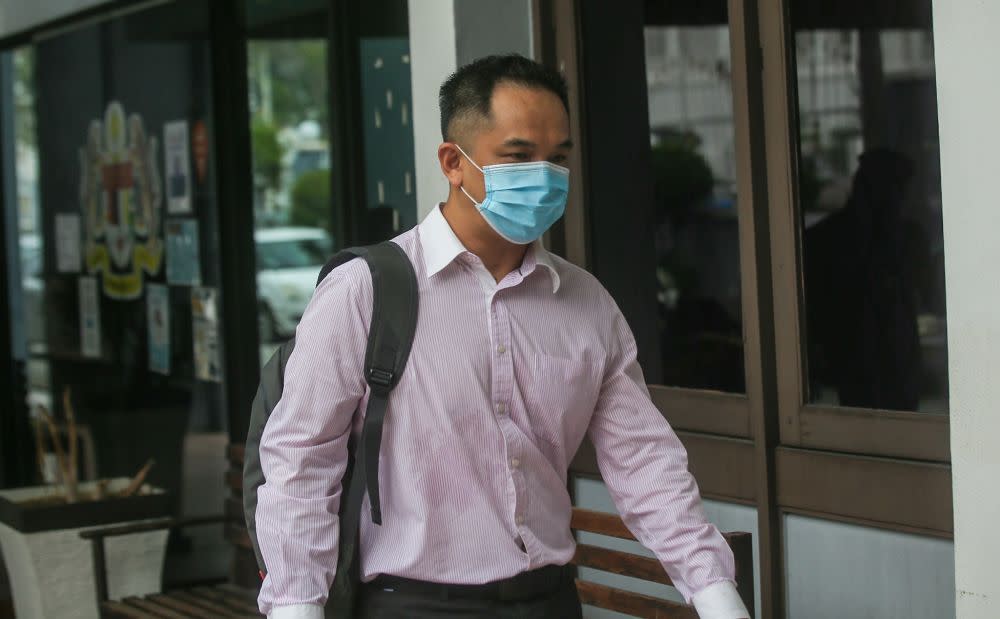 Rantau Urusan (M) Sdn Bhd director Lee Wei Jin, 38, arrives at the Ipoh Sessions Court on July 29, 2021. — Picture by Farhan Najib