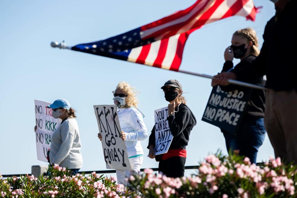 Counterprotesters confront a group called Flags of the South in front of The Confederate Defenders of Charleston in historic downtown Charleston, South Carolina, on Oct.17.