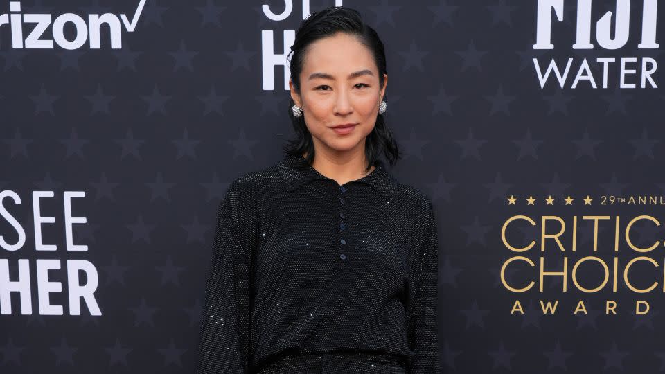 Greta Lee, nominated in the best actress category for "Past Lives," wore a sparkly all-black look from Loewe’s Spring-Summer 2024 ready-to-wear menswear collection. - Jordan Strauss/Invision/AP