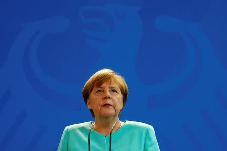 German Chancellor Angela Merkel gives a statement in Berlin, Germany, June 24, 2016, after Britain voted to leave the European Union in the EU BREXIT referendum. REUTERS/Hannibal Hanschke/Files