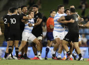 Players scuffle during the Tri-Nations rugby test between Argentina and the All Blacks in Newcastle, Australia, Saturday, Nov. 28, 2020. (AP Photo/Rick Rycroft)