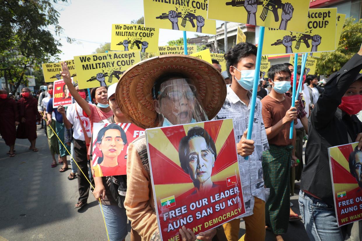 <p>Protesters demanding the release of Aung San Suu Kyi during an anti-coup rally on Monday in Mandalay, Myanmar</p> (AP)