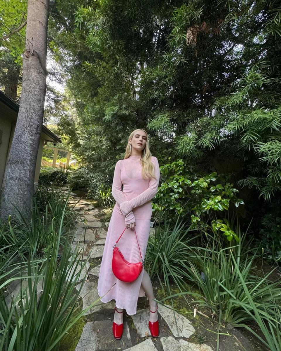 Emma Roberts with an Aupen Joy bag in scarlet.