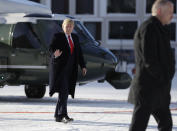 US President Donald Trump waves as he arrives in Davos, Switzerland on Marine One, Tuesday, Jan. 21, 2020. President Trump arrived in Switzerland on Tuesday to start a two-day visit to the World Economic Forum. (AP Photo/Evan Vucci)