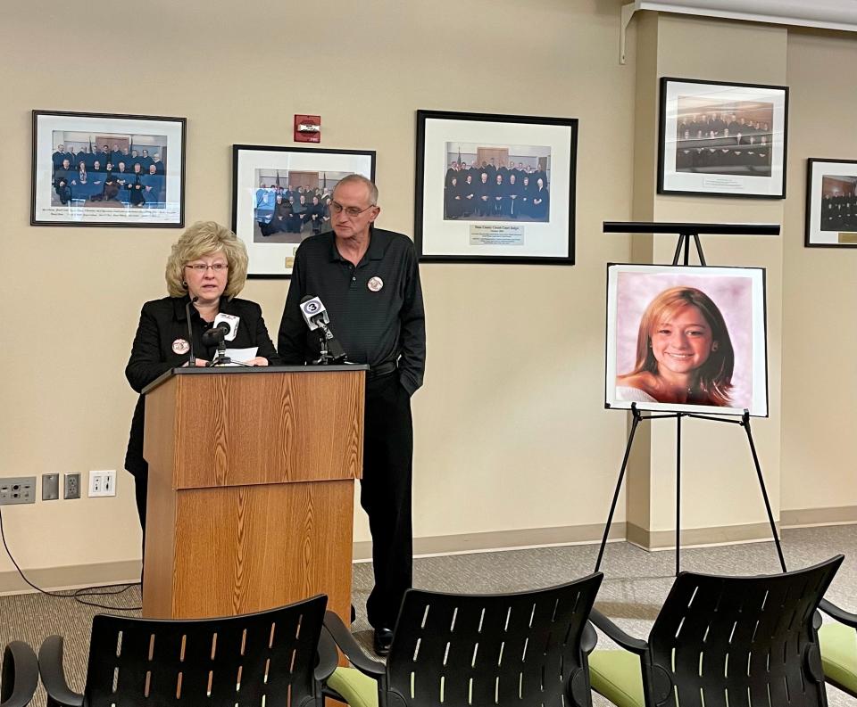 Jean and Kevin Zimmermann, parents of Brittany Zimmermann, a University of Wisconsin-Madison junior who was brutally murdered in 2008, speak at a press conference on Friday.