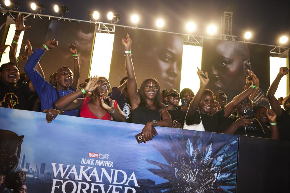 Fans attend the African Premiere of Marvel Studios' "Black Panther: Wakanda Forever" on November 6, 2022 in Lagos, Nigeria.