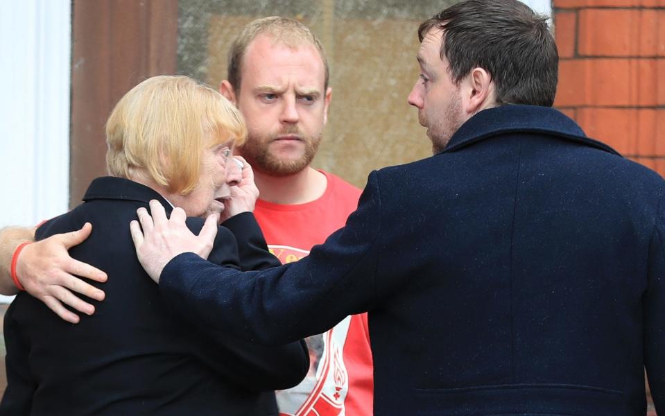 A tearful family member leaves a briefing from the CPS in Warrington on Wednesday afternoon - Credit: Peter Byrne/PA