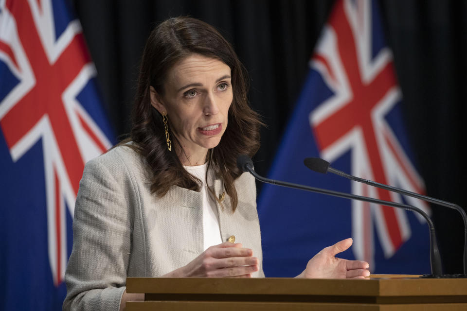 New Zealand Prime Minister Jacinda Ardern reacts during a press conference in Wellington, New Zealand, Friday, Aug. 14, 2020. Ardern announced that the three-day lockdown in Auckland would be extended by another 12 days at level 3, the rest of New Zealand will stay at level 2 restrictions as health authorities investigate the source of the first domestic coronavirus outbreak in more than three months. (Mark Mitchell/New Zealand Herald via AP)