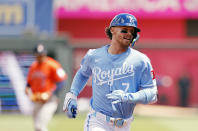 Kansas City Royals' Bobby Witt Jr. rounds third base after hitting a two-run home run during the first inning of a baseball game against the Houston Astros in Kansas City, Mo., Thursday, April 11, 2024. (AP Photo/Colin E. Braley)