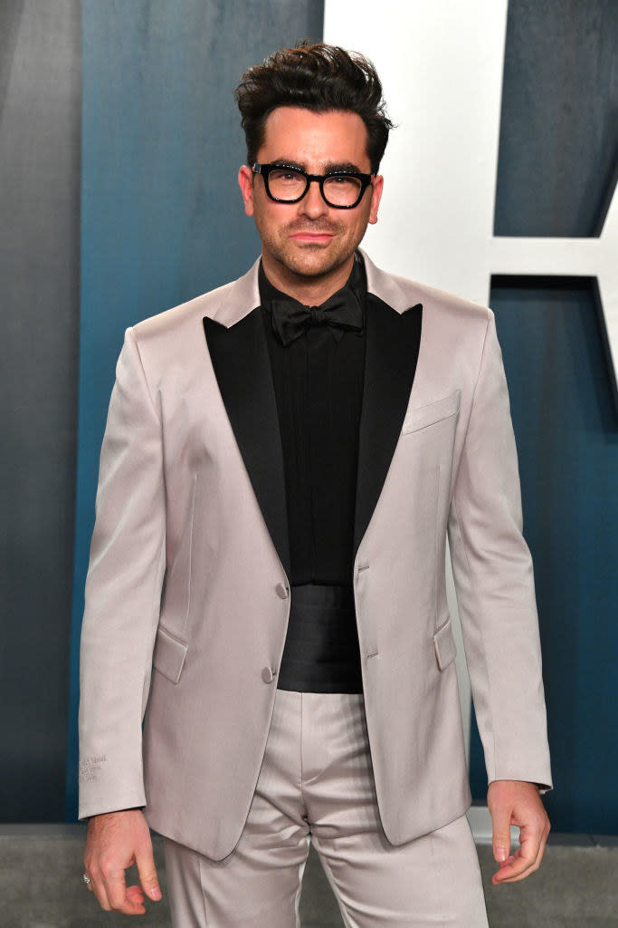 Dan Levy smiling